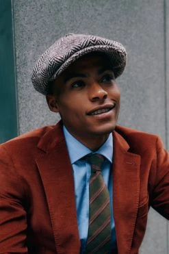 Muirfield Herringbone Bakerboy Cap -Chic Hats Shop MUIRFIELD HERRINGBONE BAKERBOY CAP LIFESTYLE SHOT 2